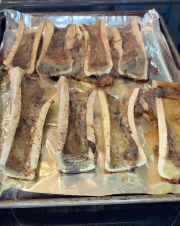 Cooked beef bones with the marrow pulling away or liquified