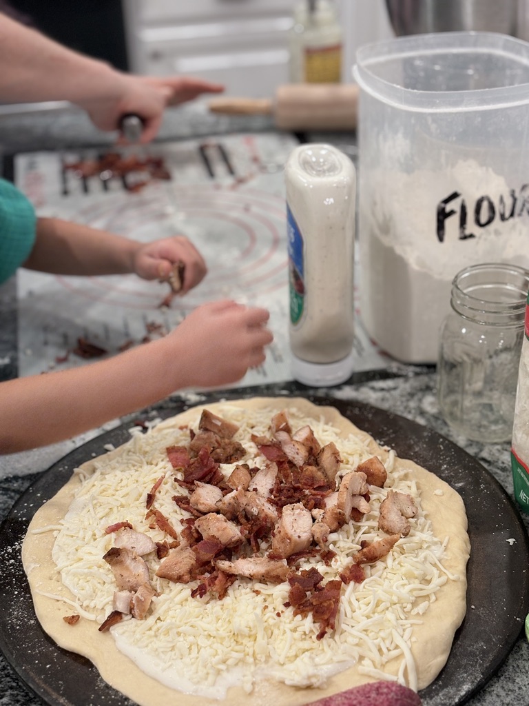 Making memories while making pizza with Grandma
